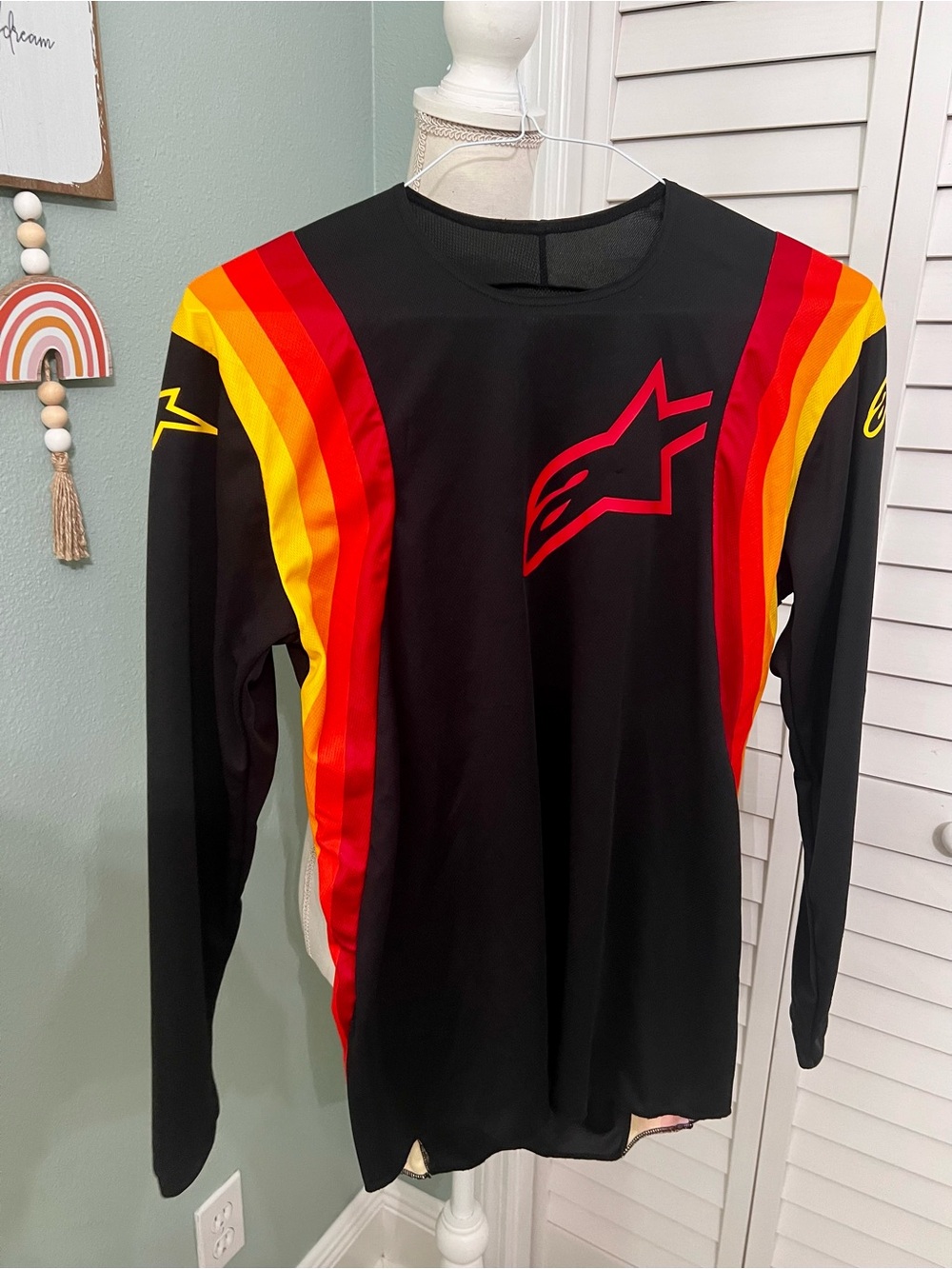 Alpinestars Black Jersey with Red, Orange and Yellow Stripe Accents